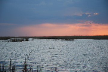 Spring evening on a lake in the steppe. A spring evening descends over the lake.
