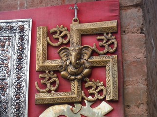 BUDDHISM // GANESE AND ESVASTIC BUDDHIST CROSS // GHANESA // KATHMANDU // NEPAL