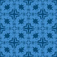 Obraz premium Indigo crosses ornament seamless vector pattern. Decorative texture surface print design for fabrics, stationery, textiles, gift wrap, textiles, and packaging.