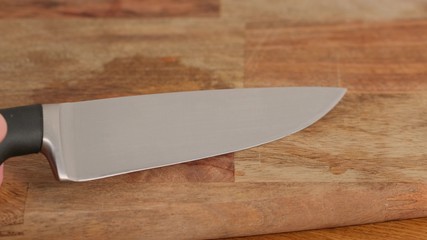 Close up man hand showing Chef Knife