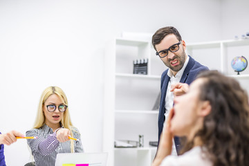 Blurred photo of business people having discussion.