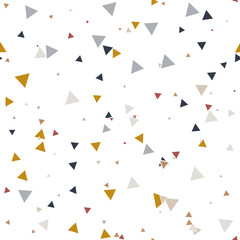 Abstract Memphis seamless pattern with colorful chaotic small triangles. Infinity triangular messy geometric pattern. Colorful Terrazzo tile. Vector illustration.