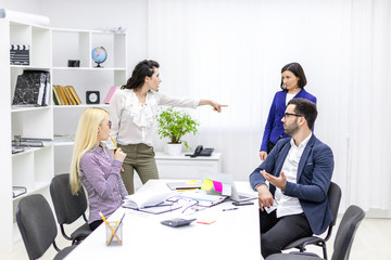 Business people finishing up a meeting at office.