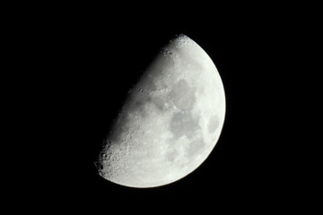 Half moon in the middle of its way