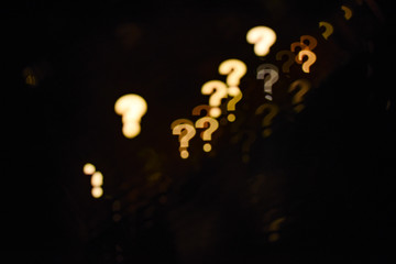 Abstract question mark shape bokeh background