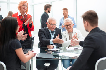 Business people shaking hands, finishing up a meeting