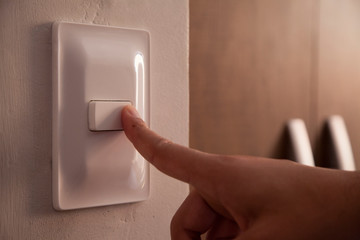 Cleaning the room light switch coronavirus prevention