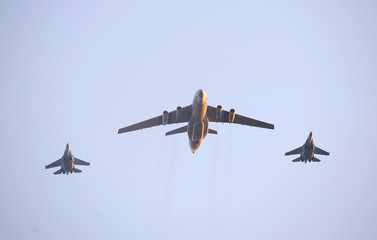 Warplanes flying in a sky