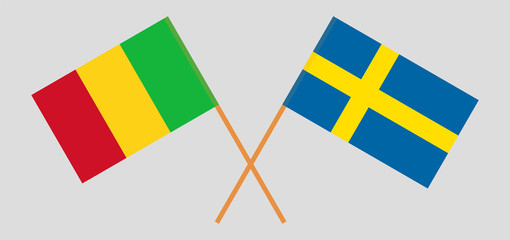 Crossed flags of Mali and Sweden