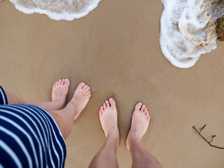 feet on the beach