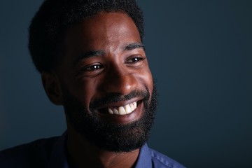 Beautiful afro man in front of a background