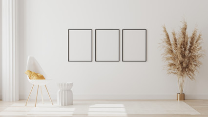 Blank frames on white wall in empty room with column and white chair with yellow pillow, coffee table , 3d rendering