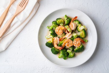 Stir Fried Broccoli with Shrimp in white plate.Top view