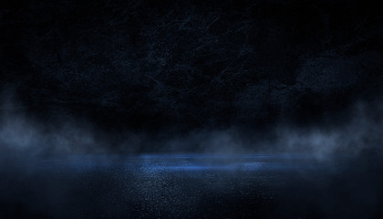 Dark empty street. Dark empty scene, blue neon searchlight light, wet asphalt, smoke, night view, rays.