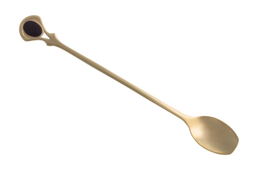 Long spoon for coffee and other drinks in oriental style, isolated top view