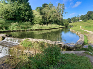 Youlgraeve, Bakewell, Peak District Wil Swimming area in River Bradford with Waterall