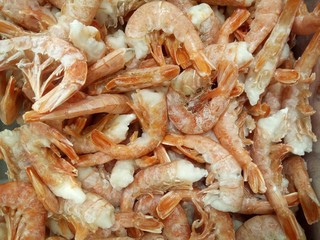 shrimp cooked frozen headless on the store counter