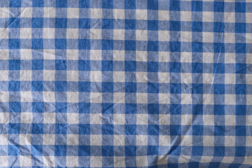 Cotton fabric. Crumpled cotton fabric in a blue and white check. Background