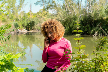 woman talking on the phone with her smartphone