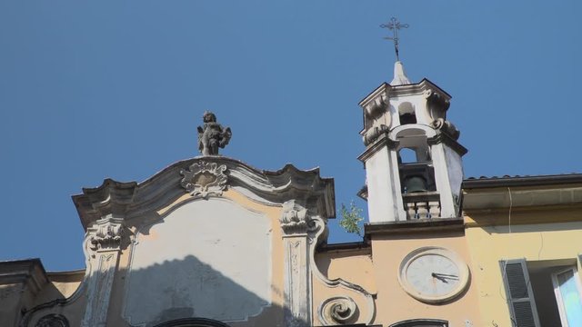 Italian church San Fabiano in old town Intra, northern Italy, Europe - zooming in
