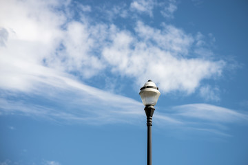 Closeup of modern street light on blue sky background