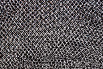chain mail close up texture background. abstract iron ring backdrop. protection concept