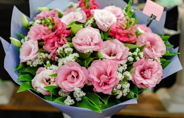 bouquet of pink eustoma flowers, bright bouquet with cut natural flowers