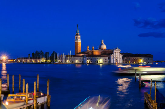 Night  Venice, view of Church of San Giorgio Maggiore. Set on an island, an art-filled, bright white church by Palladio giving Venice views from its tower.
