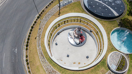 Ibarra, drone photography from entrance main to colonial city of northern of Ecuador, monument located in roundabout called “Redondel de la Madre”