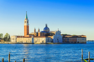 Fototapeta na wymiar Church of San Giorgio Maggiore . Set on an island, an art-filled, bright white church by Palladio giving Venice views from its tower.Venice.Italy