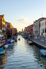 Canal on the island of Murano at sunset hours. Venice, Italy