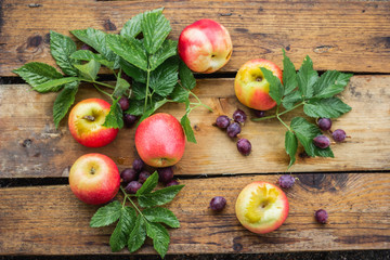 Still life of ripe fresh apples on wooden boards