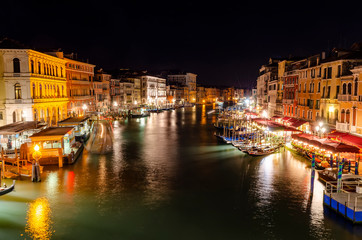 Night view of the Grand Canal from Rialto Bridge (Ponte di Rialto). Venice, Italy