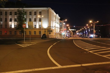 Fototapeta na wymiar night street in Minsk with cars and buildings