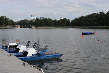 Fototapeta na wymiar boat station in Minsk with building and pier