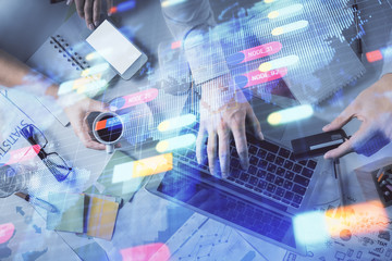 Double exposure of man and woman working together and data theme hologram drawing. Computer background. Top View.