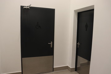 toilet room doors with symbols