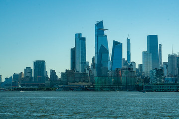 Fototapeta na wymiar New York, NY / USA - 8/20/20: a view of Hudson Yards on the westside of Manhattan and the Hudson River.