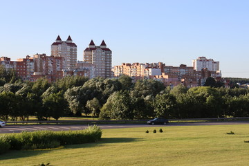 Fototapeta na wymiar Minsk suburb with residential buildings and green park