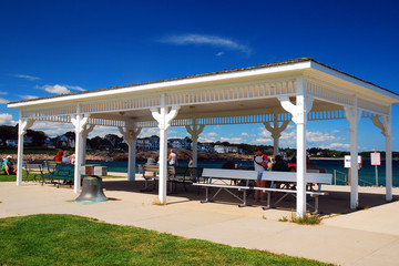 A pavillion offers shade for those at Short Sands Beach in York Maine