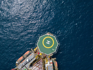 Offshore jack up rig and tow vessels during the rig move operation at the offshore location