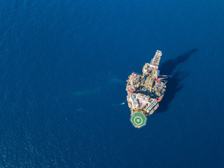 Aerial view from a drone of an offshore jack up rig at the offshore location during day time