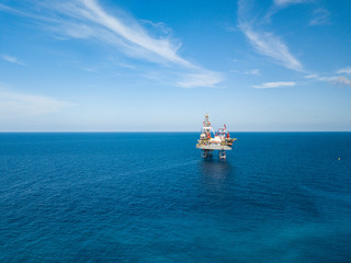 Aerial view from a drone of an offshore jack up rig at the offshore location during day time