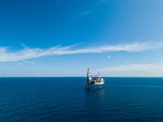 Aerial view from a drone of an offshore jack up rig at the offshore location during day time