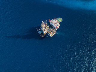 Aerial view from a drone of an offshore jack up rig at the offshore location during day time