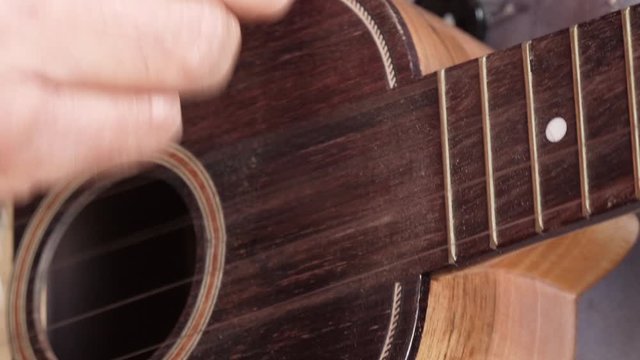 playing ukulele guitar 