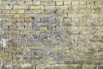 the old yellow brick wall