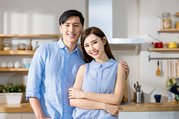 asian couple smile to you