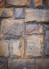 Pattern gray color of modern style design decorative uneven cracked real stone wall surface with cement.