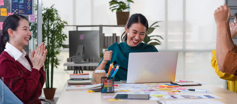 Poster asian female leader and ux/ui designer clapping hand for successful of mobile app interface wirefram